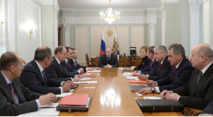 Russian President Vladimir Putin, center, chairs a Security Council meeting in the Kremlin in Moscow, Russia, Friday, March 28, 2014. Russia's president says Ukraine could regain some arms and equipment of military units in Crimea that did not switch their loyalty to Russia. (AP Photo/RIA-Novosti, Alexei Nikolsky, Presidential Press Service)