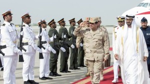 Abu Dhabi's Crown Prince Sheikh Mohammed Bin Zayed Al Nahyan (R) and Egypt's army chief Field Marshal Abdel-Fattah El-Sisi (2nd R) review the honor guard upon Sisi's arrival to Abu Dhabi on March 11, 2014. (REUTERS/Emirates News Agency/WAM/Handout via Reuters)