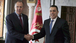 Tunisian Prime Minister Mehdi Jomaa (R), greets Russian Foreign Minister Sergey Lavrov in Tunis on March 4, 2014. (AP Photo/Hassene Dridi)