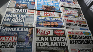 The headlines of Turkish newspapers on Friday March 28, 2014, a day after Turkish authorities moved to block access to YouTube after an audio recording of a government security meeting was leaked on the video-sharing website. Some headlines read: " Suleyman Shah Bomb; State Secrets Leaked; YouTube Blocked; Declaration of War; Meeting of Blood Lobby; Situation is Serious; Treason, Worse of Treason." (AP Photo/Burhan Ozbilici)