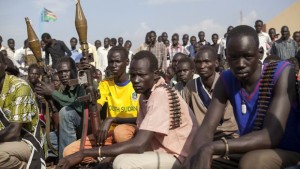 Members of the White Army, a South Sudanese anti-government militia, attend a rally in Nasir on April 14, 2014.(AFP PHOTO / ZACHARIAS ABUBEKER)