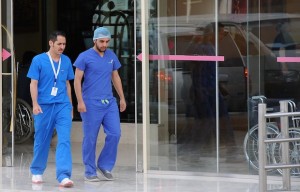 Saudi medical staff leave the emergency department at a hospital in the center of the Saudi capital Riyadh on April 8, 2014.(AFP PHOTO/FAYEZ NURELDINE)