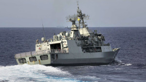 In this April 7, 2014, photo provided by the Australian Defence Force, the HMAS Toowoomba maneuvers in the southern Indian Ocean, where it is deployed in the search of the missing Malaysia Airlines Flight MH370. (AP Photo/ADF, Julianne Cropley, HO)