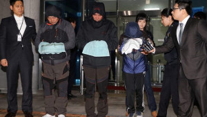 The captain of the ill-fated ferry Sewol, Lee Joon-seok (C), is detained along with two other crew members for violating maritime laws and negligence of duty in the deadly sinking at sea off Jindo Island on 16 April 2014. (EPA/YONHAP SOUTH KOREA OUT)