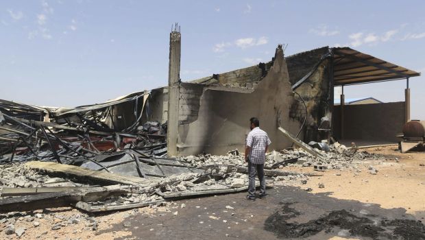 Libya: Benghazi clashes leave 70 dead as hundreds flee