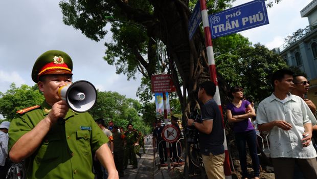 Vietnam stops anti-China protests after riots, China evacuates workers