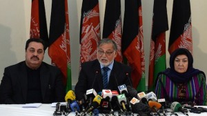 Head of the Afghan Independent Election Commission Ahmad Yousuf Nuristani (C) speaks during a press conference in Kabul on May 15, 2014. (AFP PHOTO/WAKIL KOHSAR)
