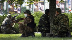 Pro-Russian rebels of the Battalion Vostok take positions outside the local administration building in the eastern Ukrainian city of Donetsk, on May 29, 2014. (REUTERS/Yannis Behrakis)