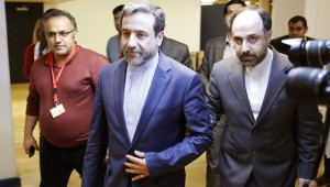 Abbas Araghchi (C), Iran's chief nuclear negotiator, arrives at the Austria Center Vienna after another round of talks between the P5+1 on May 16, 2014. (AFP PHOTO/DIETER NAGL)