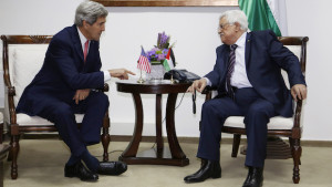 File photo of US Secretary of State John Kerry and Palestinian President Mahmoud Abbas meeting in Ramallah on December 5, 2013. (AP Photo/Mohamad Torokman, Pool, File)