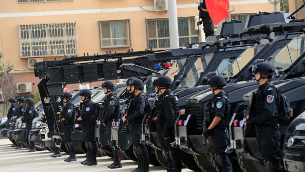 Chinese police shoot dead 13 attackers in restive Xinjiang