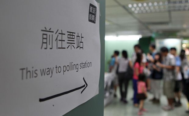 Hong Kong wraps up unofficial democracy poll in defiance of Beijing