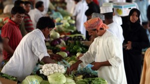 Omanis shop at a market in Muscat on August 11, 2010. (MOHAMMED MAHJOUB/AFP/Getty Images)