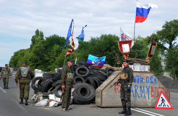 Ukraine threatens to retake territory from defiant rebels