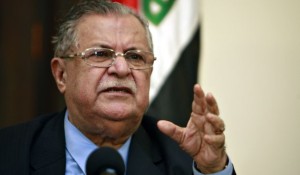 Jalal Talabani addresses a press conference in Baghdad in this March 2, 2009, file photo.(AFP PHOTO/ALI AL-SAADI)