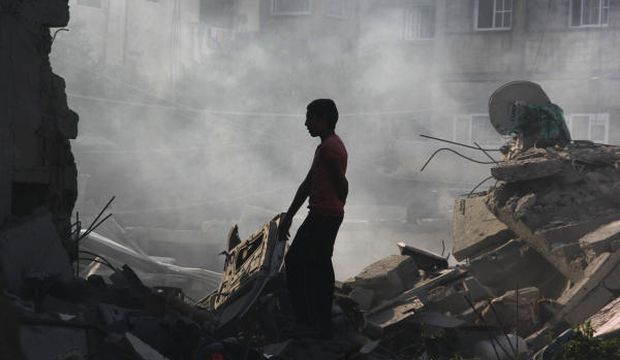 Ten dead in strike on Gaza school as Israel renews shelling