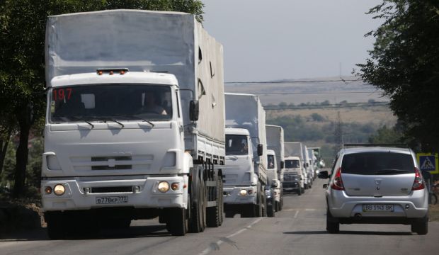 Russian aid convoy drives into Ukraine
