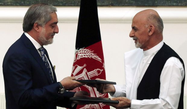 Afghanistan’s presidential rivals sign deal for power-sharing government