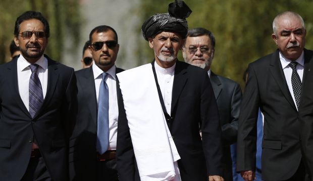 Afghanistan swears in new leader amid dispute, violence