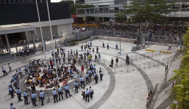 Hong Kong students cleared from inside government compound