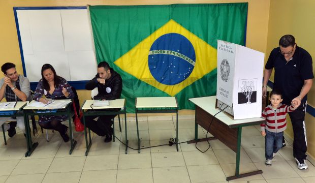 Brazilians voting in nail-biter election for president