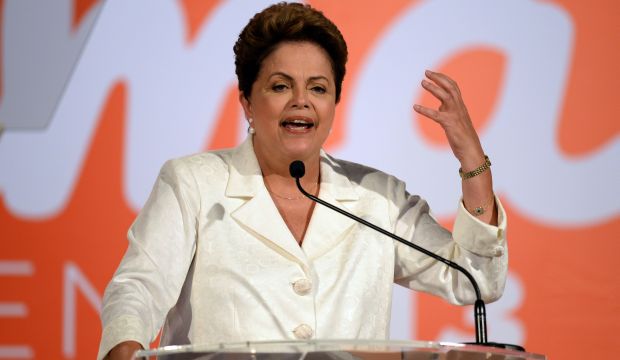 Brazil’s Rousseff in tight runoff against pro-business Neves