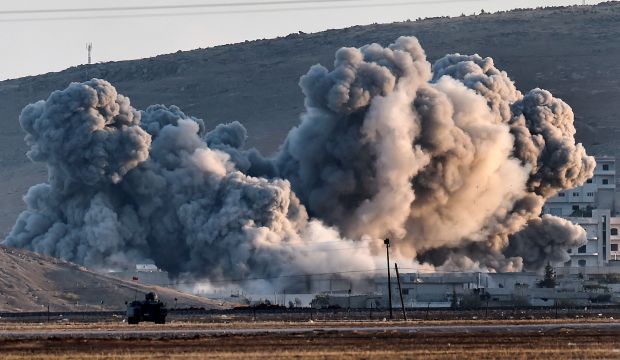 New US-led airstrikes hit besieged Syrian town