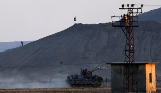 Kurds say airstrikes push ISIS back from Kobani