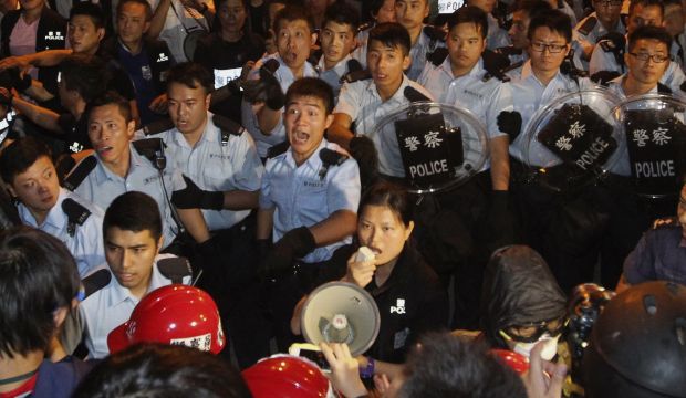 Hong Kong tension rises with police beating of protester