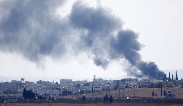Ramped-up air strikes stall ISIS advance on Syrian town