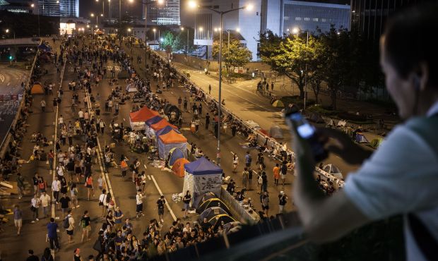 Pitching tents, Hong Kong democracy protesters dig in for long haul
