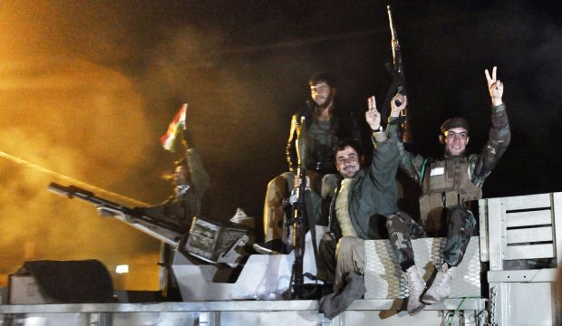 Kurdish Peshmerga forces enter Syria’s Kobani after further air strikes