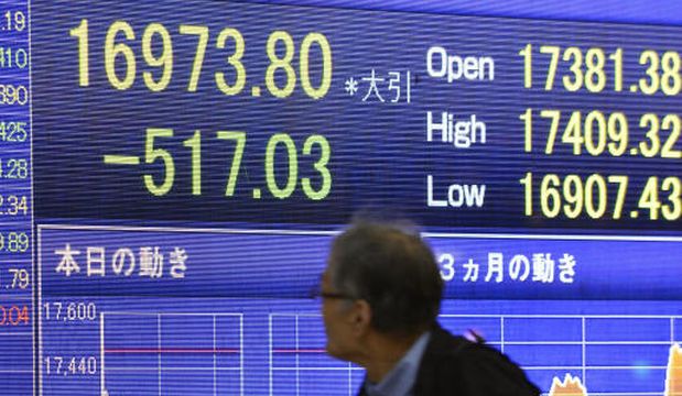 Japan slides into recession as tax hike takes toll