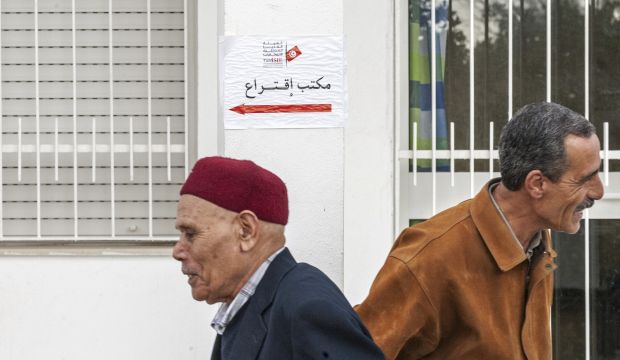 Tunisians vote in historic presidential run-off
