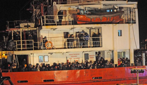 Four migrants found dead on packed cargo ship brought to Italy