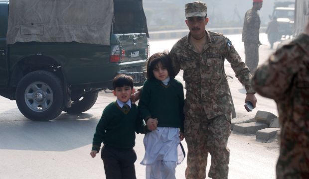 Taliban storm Pakistani school, killing 126