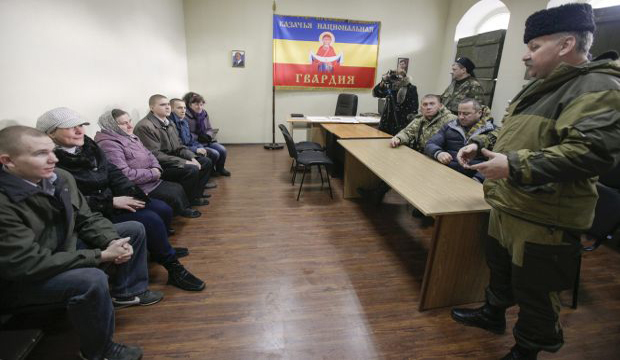 Kiev and rebels begin mass prisoner exchange