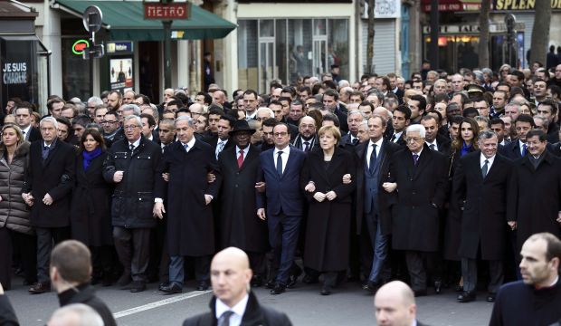 After attacks, arm-in-arm world leaders join mass Paris march