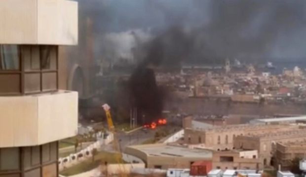 At least eight dead as gunmen storm hotel in Libyan capital