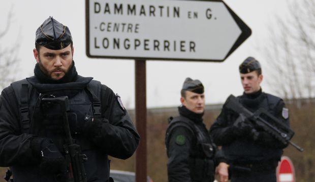 French police seal off town as they close in on newspaper killing suspects