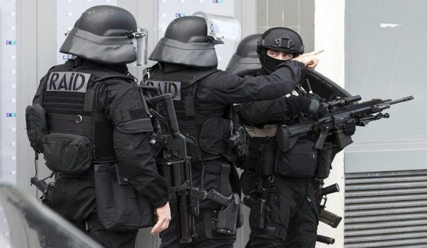 Paris police arrest 12 linked to shootings