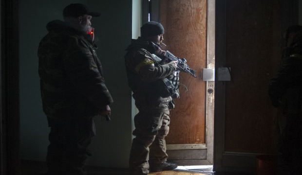 Artillery fire kills at least 12 civilians in Donetsk