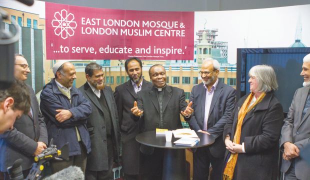 Mosques around Britain open their doors to non-Muslims to ease tensions