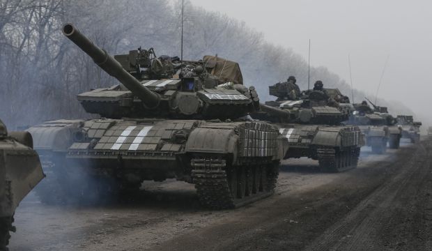 Guns mostly fall silent in east Ukraine as ceasefire takes hold