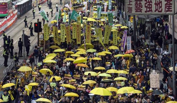 Pro-democracy protesters back in Hong Kong, no violence