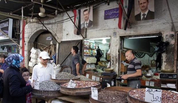 Syrian economy “devastated” by conflict: report