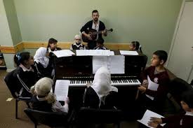 Palestinians Teach Blind Students English via Music