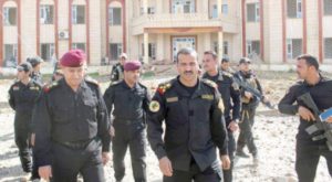 Iraqi soldiers patroling around the governmental building in Hit, Anbar after freeing it from ISIS militants