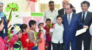 President Hollande met on Sunday Syrian refugees in Dalhamieh camp in the eastern Bekaa region