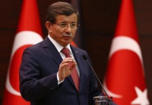 Turkish Prime Minister Davutoglu speaks during a joint news conference